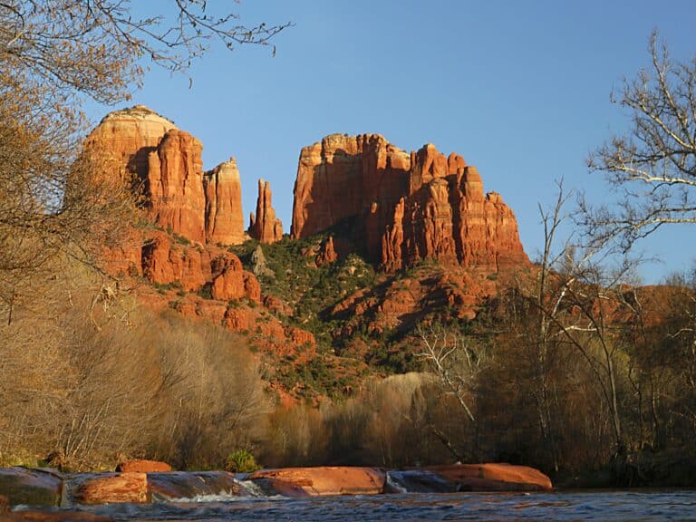 Red rock spires of Cathedral Rock at golden hour in Sedona, Arizona